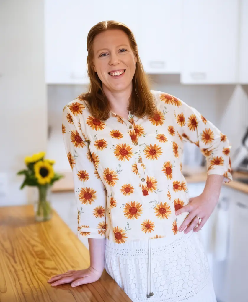 Philippa smiling in a bright kitchen